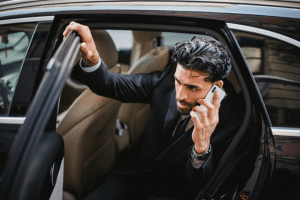 Photo by Ketut Subiyanto from Pexels: https://www.pexels.com/photo/a-man-in-a-phone-call-getting-out-of-a-car-4964960/