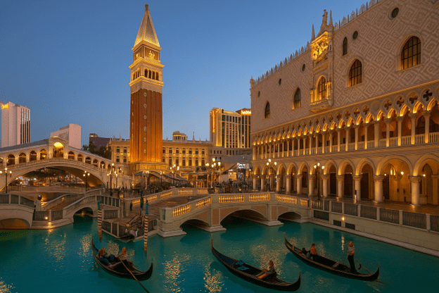 Gondolas glide through the Venetian’s Grand Canal at dusk