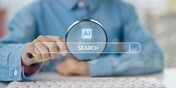 Businessmen use computers and magnifying glasses with AI search engine bars for data search optimization by artificial intelligence technology. Ai search concept.