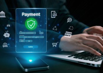 Business person initiates an online payment transaction, showcasing secure and efficient methods. Learn the best practices for safe online payment transactions. UUID