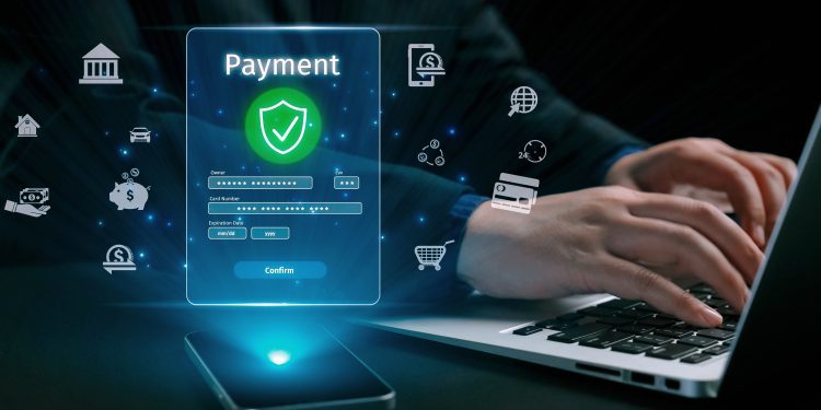Business person initiates an online payment transaction, showcasing secure and efficient methods. Learn the best practices for safe online payment transactions. UUID