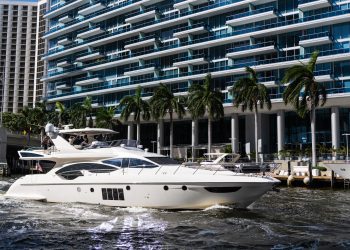 Yachting boat tourism. Luxury lifestyle. Vacation on summer. Yacht at sea. Motorboat yacht sailing at sea. Charter motorboat. Traveling by boat. Luxury boat motor yacht at sea.