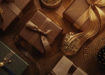 Luxury Holiday Gift Guide 2025 by Impact Wealth Magazine featuring curated travel, style, home, and wellness gifts.