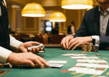 Professional dealer Eduard Lebedev at work in Cyprus, focused on procedure and atmosphere