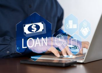 Online personal loan and financial concept. Financial loan agreement, Personal or business loans through online services between lenders and borrowers. Person using laptop laptop with loan icon.