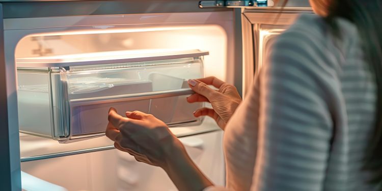 woman open empthy mini refrigerator indoors, closeup , high detail, 8k --ar 3:2 Job ID: bc845bb6-4634-4f0a-b745-455ad8582c13