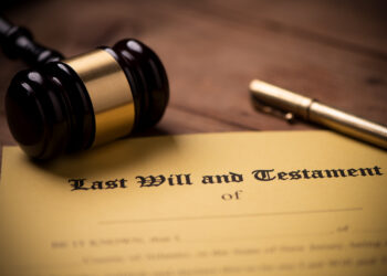 Last will and testament form with gavel. Decision, financial close up