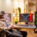 Professional gamer man using VR headset to play on powerful PC late at night in his living room