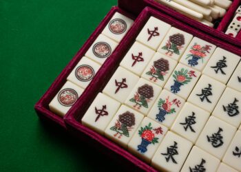 mahjong on table ancient asian board game close up image
