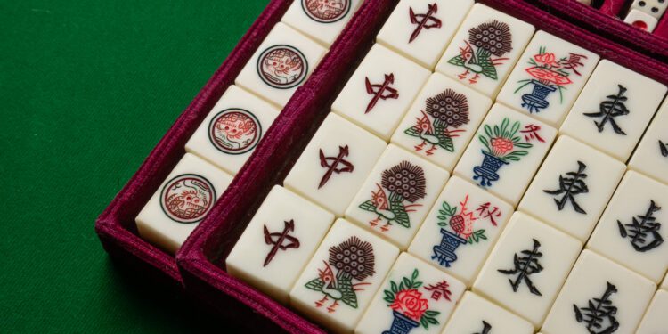 mahjong on table ancient asian board game close up image