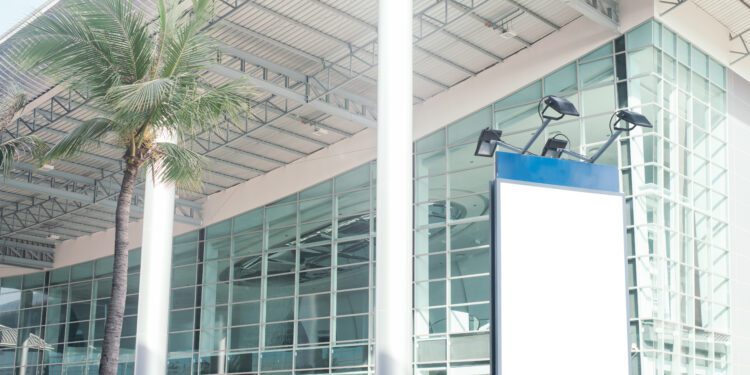 Blank city billboard with copy space for your text message or content buildings in background,selective focus