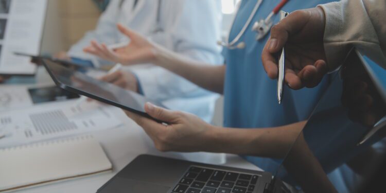 international team of professional doctors having a meeting in conference room at the modern hospital. Healthcare and medical development concept.