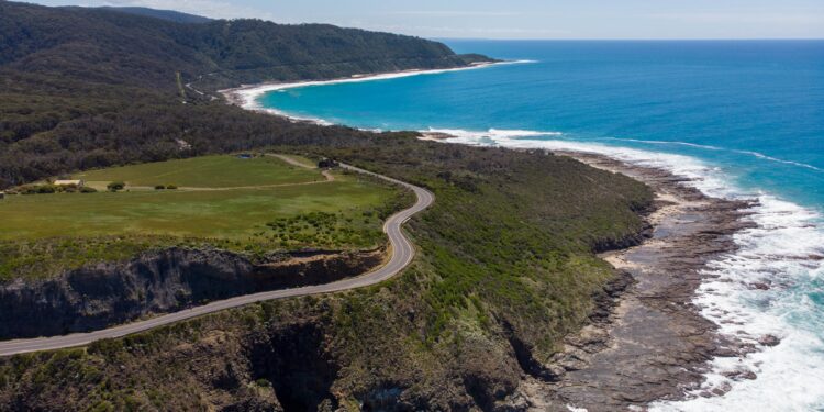 A mesmerizing scenery of a beautiful beach with blue sky in the background in Hong Kong