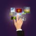 Business Hand touches the flow of images
