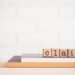 The word CLAIM, alphabets on wooden rubber stamps on top of books with bricks background, blank copy space, vintage minimal style. Concepts of compensation, legal policy and business insurance.