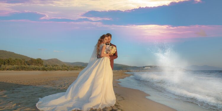 IZMIR, TURKEY - Jul 08, 2017: Young bride and groom in wedding dress, as well as casual wedding dress outdoors.