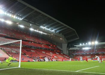 Mohamed Salah (11) of Liverpool scores from the penalty spot to give Liverpool a 2-0 lead