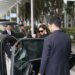 Discreet executive protection professional coordinating secure travel for a family office principal