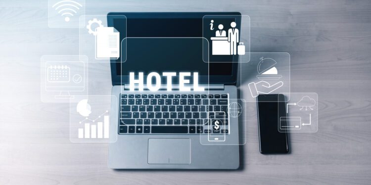 Digital Hotel Management Concepts with Laptop and Smartphone Displaying Icons Related to Reservation, Services, and Guest Experience in Modern Hospitality Quark.