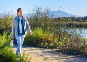 Above: A local resident enjoys a walk in the San Joaquin Marsh and Wildlife Sanctuary in Irvine, CA
