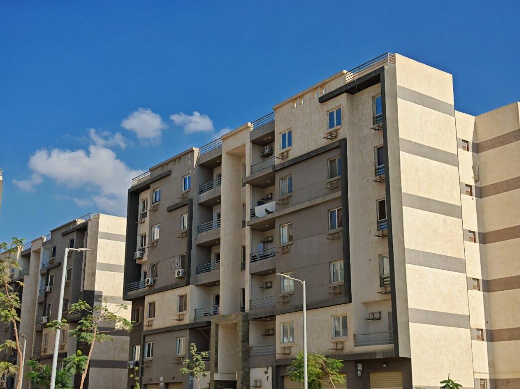 Modern Apartment Building Against Blue Sky