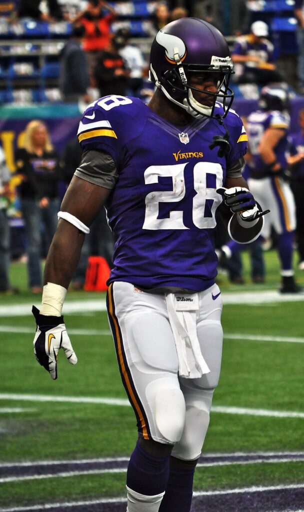 Adrian Peterson playing for the Minnesota Vikings in 2013