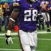 Adrian Peterson playing for the Minnesota Vikings in 2013