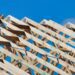 Timber roof trusses on a new home under construction; illustrative image by Troy Mortier